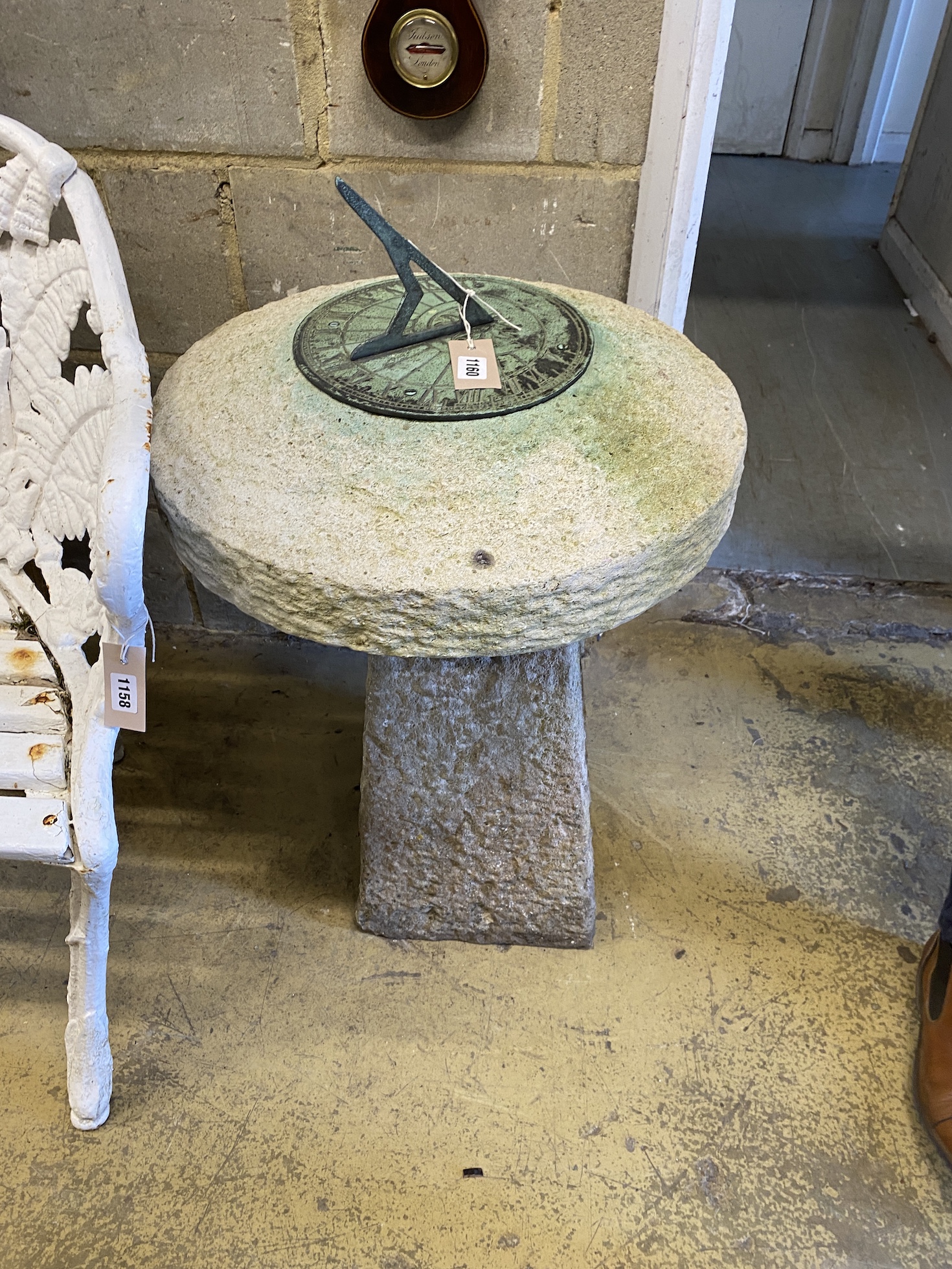 A reconstituted staddle stone with sundial top, height 82cm